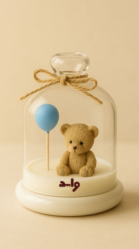 Picture of Teddy bear with blue ballon